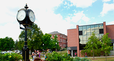 Wide view of the campus mall and clock tower