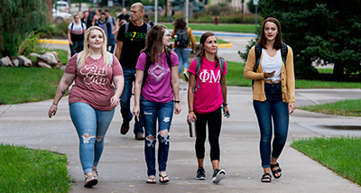 Group of Greek life students walk to class on the first day of the semester