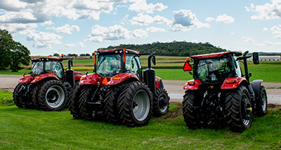 Three tractors parked outside at Mann Valley Farm