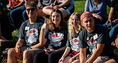 Four students attend a Week of Welcome event